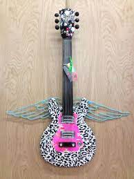 Pin By Darice Lang On Decorated Guitars Guitar Wall Art Decorated Guitars Pink Wallpaper Iphone