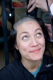 Photos of mummy's head being shaved