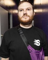 Mr Danger getting a 450 splash onto light tubes and a springboard leg drop  onto light tubes