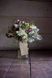 The centerpieces had similar flowers with babies breath. Rustic Country Wedding Bouquets Rustic Wedding Chic