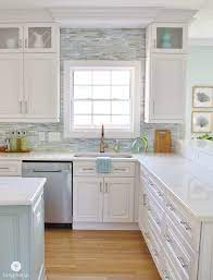 Beach house kitchen backsplash ideas. Installing A Paper Faced Mosaic Tile Backsplash Coastal Kitchen Design White Kitchen Design Beach House Kitchens