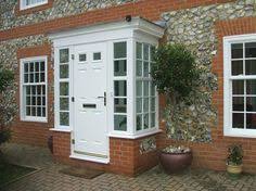 Pin By Janet Olson On Office Design Indoor Porch Small Front Porches Front Door Porch