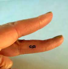 Thinking of getting a rose, lion or moon? 155 Finger Tattoos That Will Make You Adore Your Fingers With Meanings Wild Tattoo Art