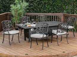 Easy access door on the side for gas tank exchange, and hidden tank from visible. Living Room Carlisle Aged Bronze Cast Aluminum 7 Pc Dining Set With 84 X 44 Fire Pit Dining Table