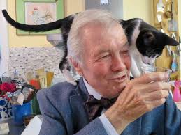 Good afternoon. You have perhaps seen me with my dog, Gaston. Here is one  with Claudine's cat, Hibou. He would try to drink anything in my glass.  Have a good day. -JP