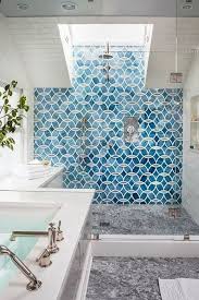 Some of the best shower tile ideas use a variety of tile types to their fullest potential. Beautiful Bathroom With Natural Light And Blue Tiling Bathroom Tile Designs Blue Bathrooms Designs Chic Bathrooms