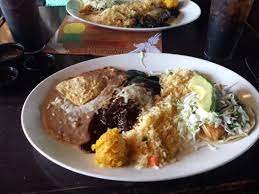 Tequila jacks fish tacos battered seasonal fresh fish, pickled cabbage, red jalapeño, corn salsa, chipotle aioli, served with black bean salsa & mexican rice. Mole Enchiladas With Rice And Beans Corn Pudding And A Fish Taco Picture Of Tequila Jack S Long Beach Tripadvisor