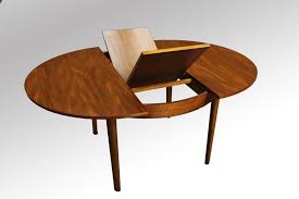 Danish Modern Teak Round Dining Table Extendable This Is The Furniture My Mum And Dad Had Round Extendable Dining Table Round Dining Table Retro Dining Table