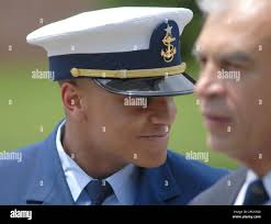 U.S. Coast Guard Cadet Webster Smith walks to his car at the U.S. Coast  Guard Academy, Monday, June 26, 2006, in New London, Conn. Smith is charged  with rape, sodomy, extortion and