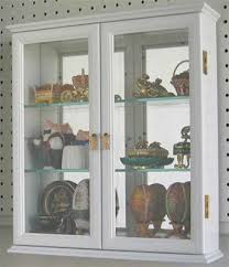 Find the best prices for wall curio cabinets on shop better homes & gardens. This Two Door Cabinet Would Add A Beautiful Touch To Your House The Cabinet Would Be Perfe Wall Curio Cabinet Wall Display Case Wall Mounted Display Cabinets