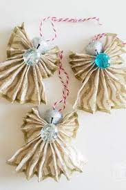 Angel holding seashell ornament with multiple style ootions: 20 Diy Angel Ornaments Easy Angel Christmas Ornament Ideas