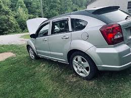 Image result for Bright Silver 2009 Caliber