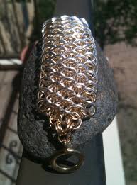 Maybe you would like to learn more about one of these? Silver And Gold Dragonscale Chainmaille Bracelet Chain Of Beauty