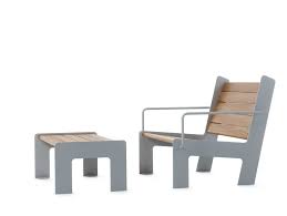 A contemporary set of garden furniture, consisting of a simple armchair made out of birch wood with a light tint, paired with a matching ottoman footstool with an. Steel And Wood Garden Armchair With Footstool Lowchair By Nola Industrier Design Mats Alden