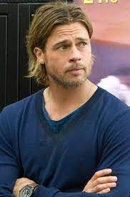 It's panic in the street in this exclusive new photo from next summer's world war z, the most expensive zombie project in hollywood history and the most focused effort to date by brad pitt. World War Z Brad Pitt Brad Pitt Long Hair Brad Pitt Haircut Brad Pitt Hair