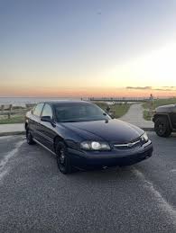 Image result for Black 2000 Impala