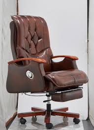 Upholstered in high quality pu leather with grey and black accents and stitching. China Factory Directly Big And Tall Brown Pu Office Chair Ergomic Executive Chair Black High Back Swivel Lift Ergonomic Leather Executive Office Chair China Office Chair Furniture Office Furniture Modern