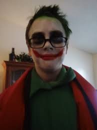 Our son putting his ticket in the bucket at the zoo's Trunk or Treat  tonight. It's a little thing, but it's a big thing.