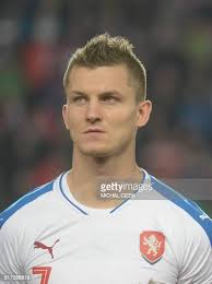 Robert Snodgrass of Scotland vies for the ball with Kamil Vacek of... News  Photo