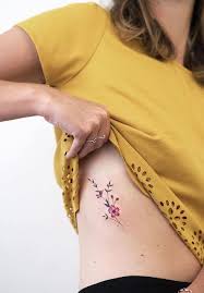 Flower rib cage tattoo 30 flowers tattoos on side rib. 225 Amazing Rib Cage Tattoo Ideas For Female And Male