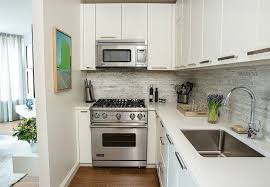 The Dos And Don Ts Of Painting Laminate Cabinets In 2020 Laminate Kitchen Cabinets Laminate Cabinets Painting Laminate Kitchen Cabinets