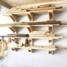 Then, attach the 2×4 to the studs at intervals. A Simple Diy Garage Lumber Rack That You Can Build Tamaras Joy