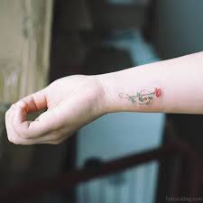 What are some cute tattoos for girls? 52 Wrist Colorful Rose Tattoo Designs
