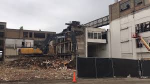 The coffee factory is located in a refurbished old factory, so think stone, wood & industrial for the feel. Demolition Begins At Old Shaw Walker Factory In Muskegon Youtube