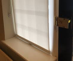 Magnetic hold down brackets for blinds. Stop Roller Blinds From Swinging Instructables