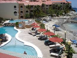 Guests enjoy the beach locale. Divi Bay Main Pool Picture Of Divi Little Bay Beach Resort St Martin St Maarten Tripadvisor