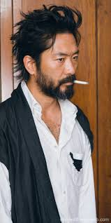 Evan MacMillan Smoking as The Trapper