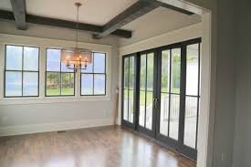 Black windows white trim interior. Consider Black Windows And Doors To Punctuate Your Color Palette The Decorologist Interior Window Trim Windows And Doors Interior Doors For Sale