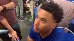 Jayhawks encounter different type of battle, beat UNCG in home opener