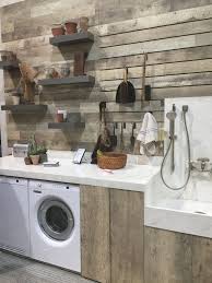 This Utility Room Designed With Wilsonart S New Rediscovered Oak Was Complete With A Functional Slat Wall An Utility Room Designs Dog Washing Station Dog Rooms