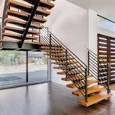 Stair stringers are usually attached to the end joist or rim joist of a deck without consideration for the extra load the stairway imposes on the deck frame. China Modern Wood Staircase Design For House Interior Straight Mono Stringer Stairs China Staircase Exterior Staircase