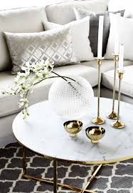 Coffee table ideas for book lovers. Gold And White Livingroom Homedecor Interiordesign With A Marble Coffee Table And Tapercandles Gold Living Room Home Decor Accessories Home Decor