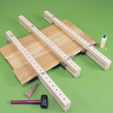 The end block clamps and anchors the wood to the board and the round piece rolls along the opposite end to secure the. Shop Made Edge Gluing Clamps The Family Handyman
