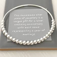 The 25th year of marriage is appropriately celebrated as the silver anniversary, symbolic of one of the most precious metals known to man and prized the world over for thousands of years. 25th Silver Wedding Anniversary Gift Bangle By Handmade By Helle Notonthehighstreet Com