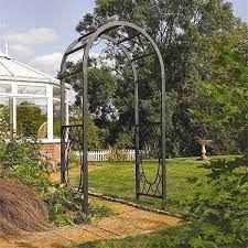 Arbors make an attractive entrance way for a path, a beautiful gateway to your yard, or a decorative boarder between any transitional. Wrenbury Round Top Metal Garden Arch Decorative Garden Arches