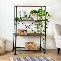 Oak revolving bookcase the square top with molded edge, above an arrangement off shelves raised up on platform base terminating in cabriole legs. Rolling Bookshelf Wayfair