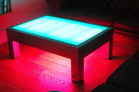 I was looking for something i didn't this coffee table leans into its coastal farmhouse look with natural wood finishes and a mixed material design. Gusmen Light Up Coffee Table