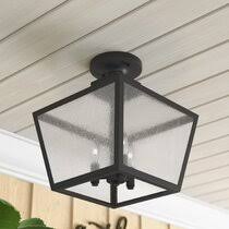 It has a simple metal frame in your choice of finish that encases a fabric shade. Porch Patio Light Semi Flush Mount Outdoor Lights You Ll Love In 2021 Wayfair