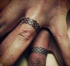 9 Wedding Ring Tattoos Ideas And Designs For Male And Female Tattoosforwomen Ring Tattoo Designs Ring Finger Tattoos Wedding Band Tattoo
