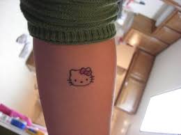 Pin By Kari Guggisberg On My Style Hello Kitty Tattoos Tattoos Dainty Tattoos