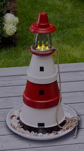 Leuchtturm Aus Tontopfen Selber Machen Video Leuchtturm Basteln Leuchtturm Gartendekor