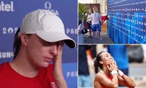 Iga Swiatek breaks into tears during an interview for Polish TV at the  Olympics after a shock semi-final loss ends her 25-match winning run