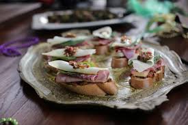 Serve rachael ray's easy, healthy bruschetta with tomato and basil appetizer recipe from 30 minute meals on food network. Muffuletta Bruschetta Valerie Bertinelli