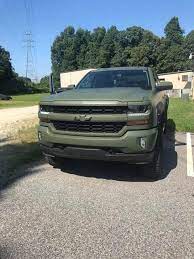 Pin By Christopher Morrison On Matte Green Silverado Chevy Trucks Silverado Chevy Trucks Chevy Silverado
