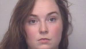 Police: Woman resists arrest with child in car