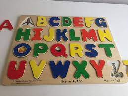All 26 letters of the alphabet feature in the peg puzzle. Melissa And Doug See Inside Alphabet Puzzle Buy Clothes Shoes Online